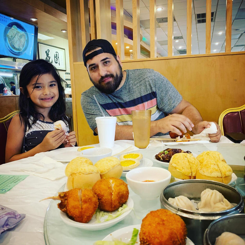 Ray Hernandez and his daughter enjoying dim sum in Rockwall